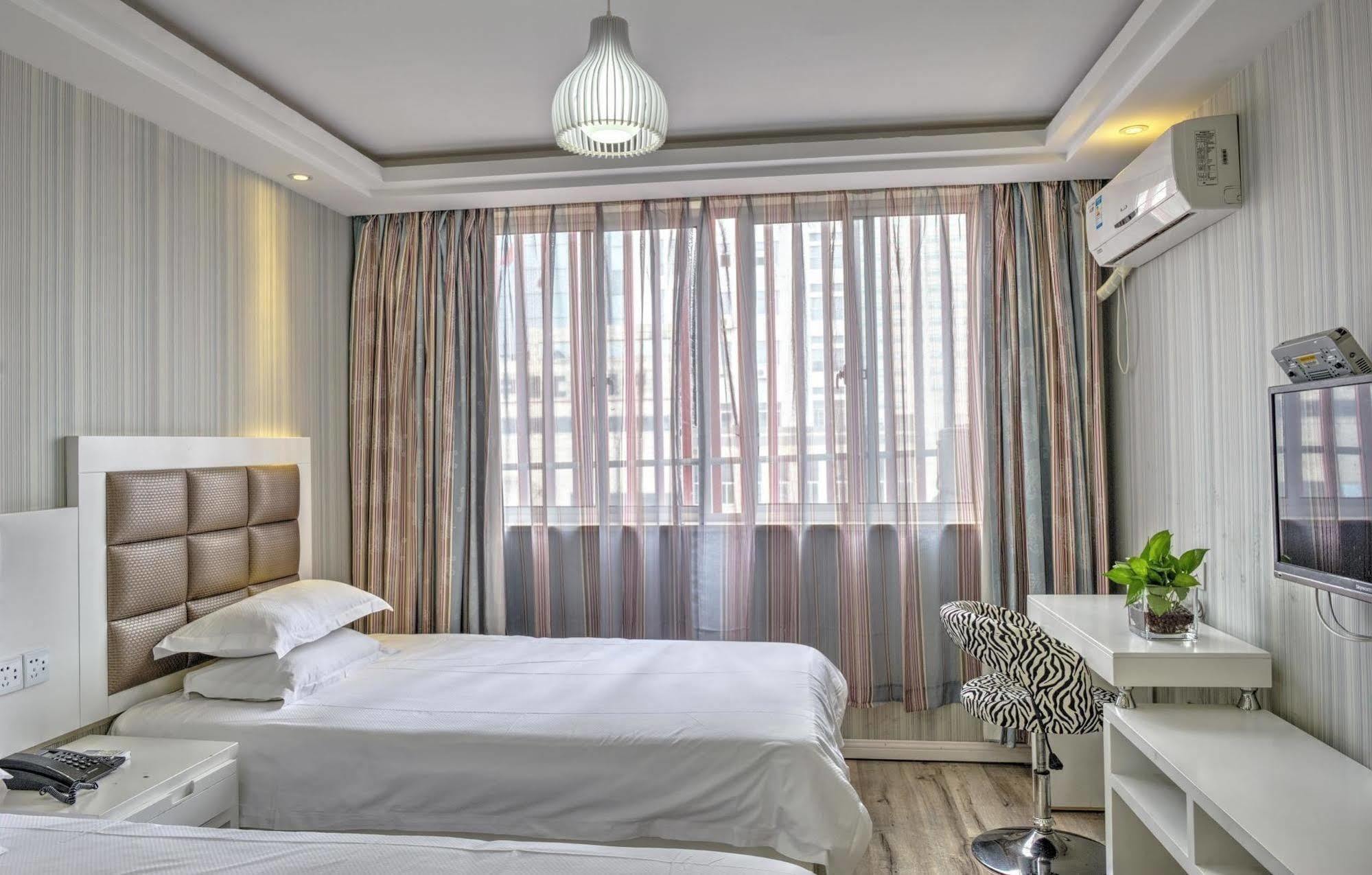 Milan Fashion Hotel Deqing Exterior photo